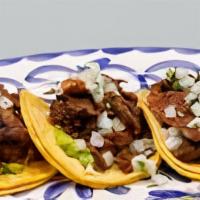 Carne Asada Taco · Gluten-free. Three tacos per platter. Citrus-marinated steak with lime, fresh guacamole, cil...