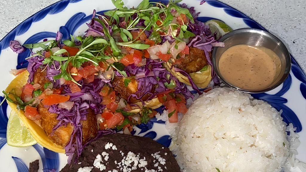 Crispy Fish Taco · Three beer-battered wild Mahi tacos with Baja slaw, pico de gallo, fresh avocado & chipotle ranch.