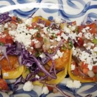 Shrimp Taco · Three citrus marinated grilled wild shrimp tacos with cabbage, pico de gallo, fresh guacamol...