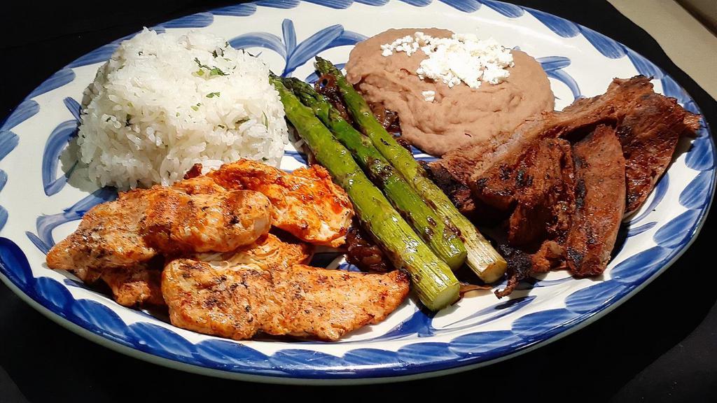Judi Siegel Platter · Marinated organic grilled chicken & grilled marinated steak with caramelized onions & grilled asparagus. Served with cilantro rice & choice of refried or black beans.