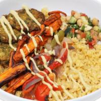 Mediterranean Bowl · Packed with your favorite Mediterranean flavors, this mix of fresh made falafel, roasted veg...