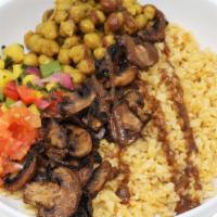 Caribbean Bowl · This colorful combination of curried chickpeas, savory jerk mushrooms, a hint of sweet mango...