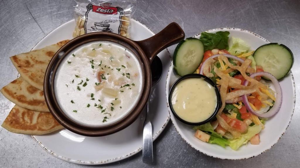 Soup/Caesar · A bowl of soup - chicken noodle or clam chowder. Served with the classic Caesar salad.