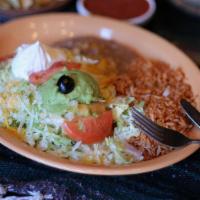 Chimichanga · Crisp, spicy pork, chicken, beef, or seafood burrito topped with lettuce, cheese, tomatoes, ...