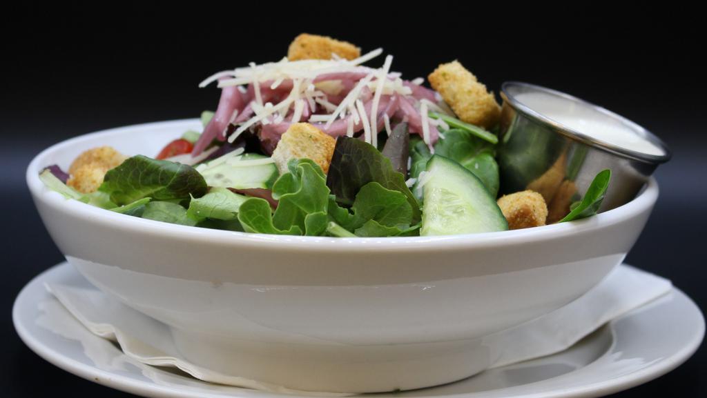 Pub Green · Vegetarian. Mixed lettuces, grape tomatoes, cucumber, marinated red onion, croutons parmesan cheese, your choice of black rabbit red vinaigrette, peppercorn ranch, blue cheese or Caesar dressing.