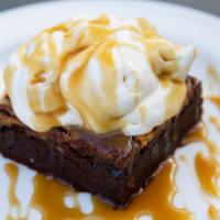 Black & Tan Brownie · Caram-ale sauce and whipped cream.