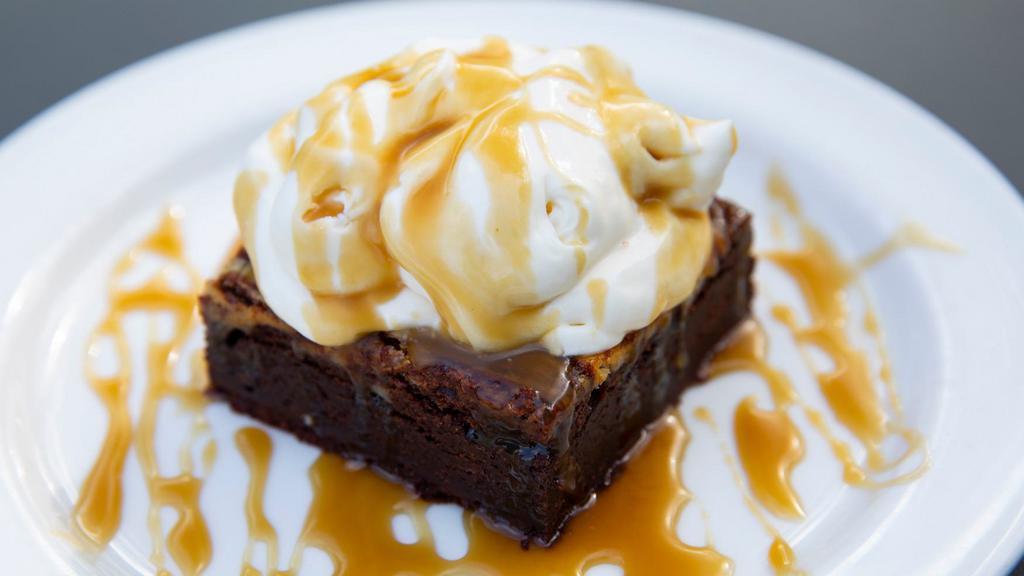 Black & Tan Brownie · Caram-ale sauce and whipped cream.