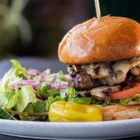 Dungeon · Swiss cheese, grilled mushrooms, lettuce, tomato, red onion, pickles and secret sauce.
