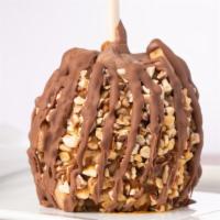 Caramel Apple Featuring Heath Toffee · Caramel-covered granny smith apple rolled in Heath toffee bits-contains almonds, drizzled wi...