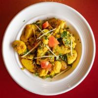 Aloo Gobi · Fresh cauliflower and potatoes cooked with fresh cilantro and ginger.