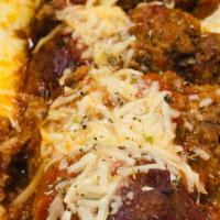 The Parmesans Sandwich · Your choice of, Meatball, Chicken or Fried Eggplant, with Marinara and Mozzarella (Starting ...