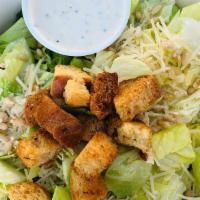 Caesar Salad · Fresh Romaine, Shredded Parmesan, Parmesan Crusted Pine Nuts, Croutons and Caesar Dressing s...