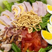 Classic Chef Salad · Turkey, Ham, Bacon, Hard Boiled Egg, Swiss, Cheddar, Tomatoes, Onions and Chow Mein Noodles ...