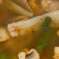 Seafood Tom Yum Soup · Spicy. Shrimp, squid, mussel, scallop, hot and sour soup of galangal root, lemongrass, and l...