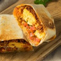 Jalapeno Bacon Breakfast Burrito · Spicy! Fresh crispy bacon strips sliced and tossed with scrambled eggs, jalapenos, and chees...