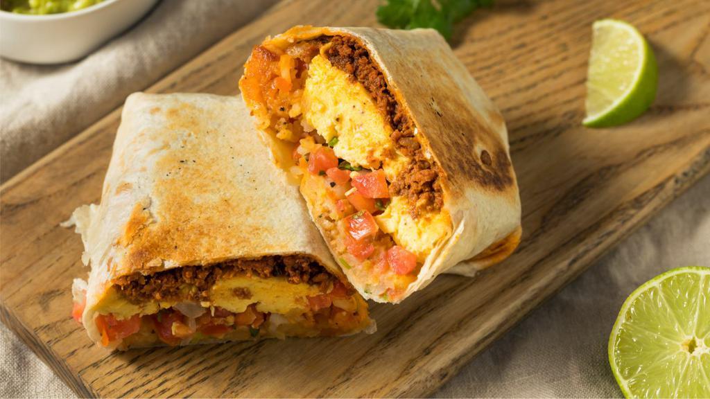Jalapeno Bacon Breakfast Burrito · Spicy! Fresh crispy bacon strips sliced and tossed with scrambled eggs, jalapenos, and cheese wrapped in warm tortilla and served.