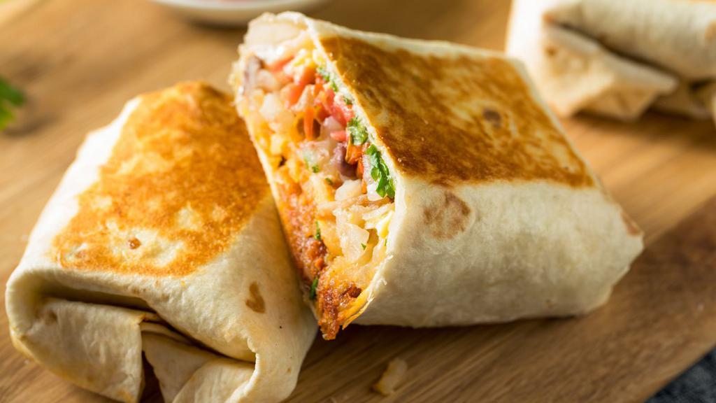 The Jalapeno Breakfast Burrito (Ham) · Spicy! Sizzling scrambled eggs tossed with slices of jalapenos, ham, cheese and pico de gallo.