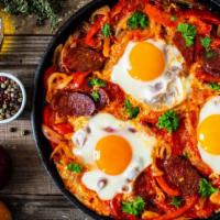 The Chorizo Breakfast Plate · Customer's choice of egg type (2 eggs), served with chorizo sausage, side of tortilla, rice ...