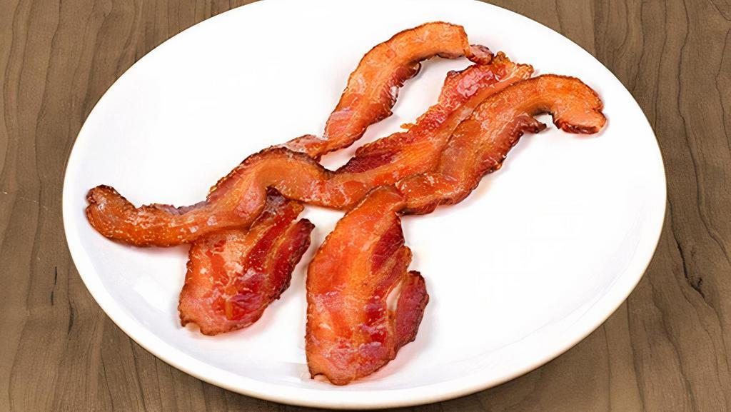 Thick Cut Bacon · three slices of our signature thick-cut bacon