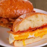 Wildflower Bacon & Cheddar · over easy eggs & truffle ketchup on a grilled brioche roll