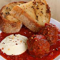 Meatballs & Ricotta Toast · two hearty meatballs & marinara sauce served with ricotta cheese & garlic bread
