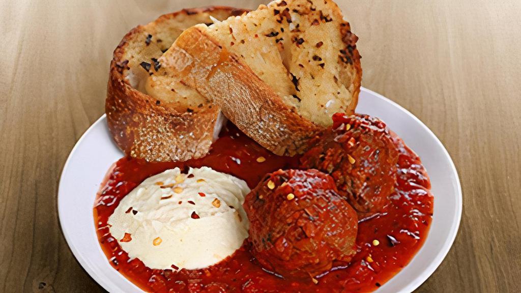 Meatballs & Ricotta Toast · two hearty meatballs & marinara sauce served with ricotta cheese & garlic bread