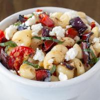 Mediterranean Pasta Salad  · cavatappi, slow-roasted tomatoes, red bell peppers, red onions, basil & all-natural feta wit...