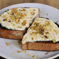 Fig & Ricotta Toast · fig confit & ricotta cheese topped with honey & toasted pistachios