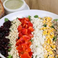 Chopped Salad · organic arugula, pearl couscous, all-natural feta, red peppers, organic dried sweet corn, dr...