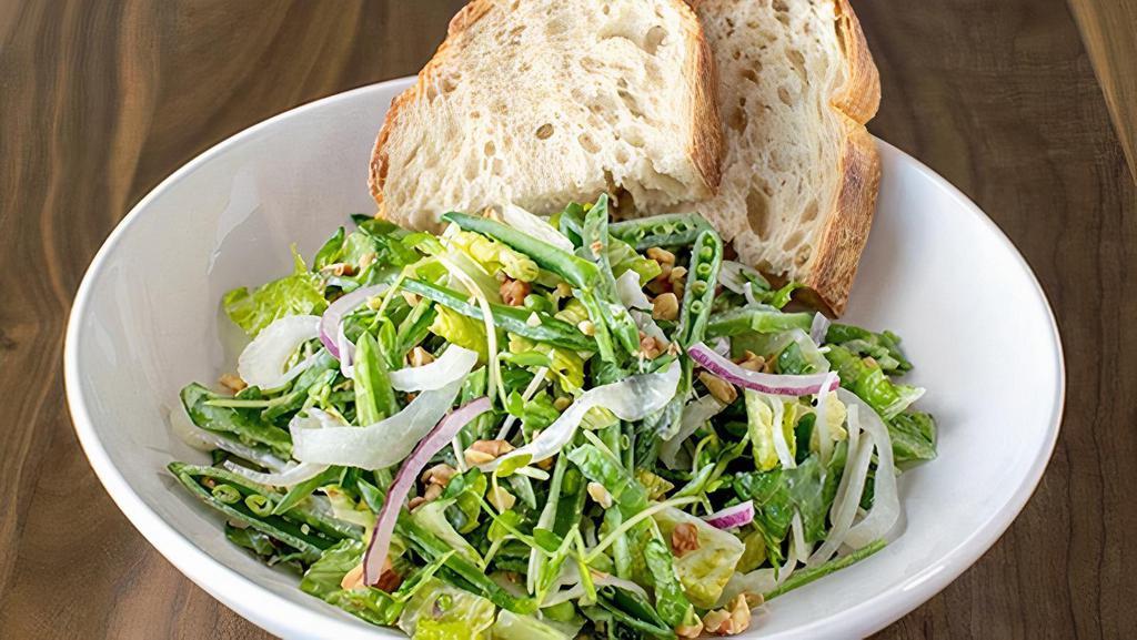Snappy Peas & Greens · romaine, pea shoots, marinated fennel, red onions, basil, toasted walnuts & all-natural lemon ricotta dressing served with artisan bread