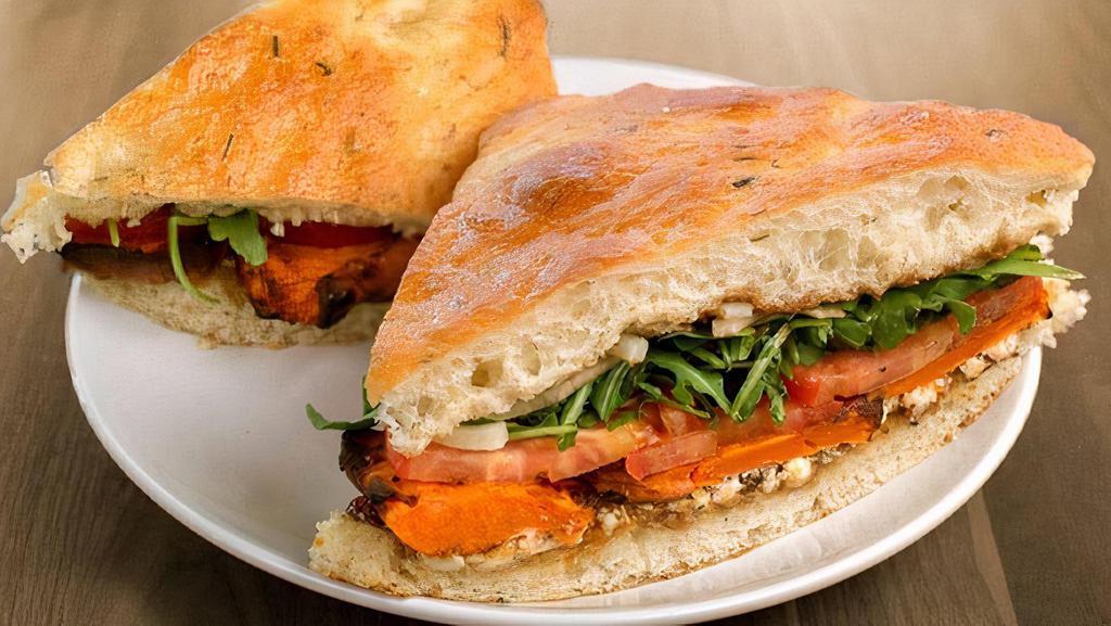 Roasted Sweet Potato · roasted sweet potato, goat cheese, fig confit, tomatoes, organic arugula, fennel, all-natural balsamic vinaigrette on herb focaccia & served with a side