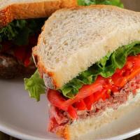 Steak & Gorgonzola · all-natural rare steak, gorgonzola, roasted red peppers, red onions, lettuce, tomatoes, herb...