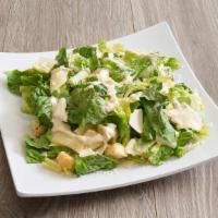 Caesar Salad · Organic romaine lettuce dressed with our caesar dressing, topped with croutons, parmesan and...