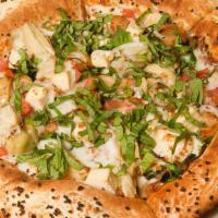 Buddha Basil Pizza · Featured on DDD, our pesto-marinara sauce topped with fresh basil, artichoke hearts, garlic,...