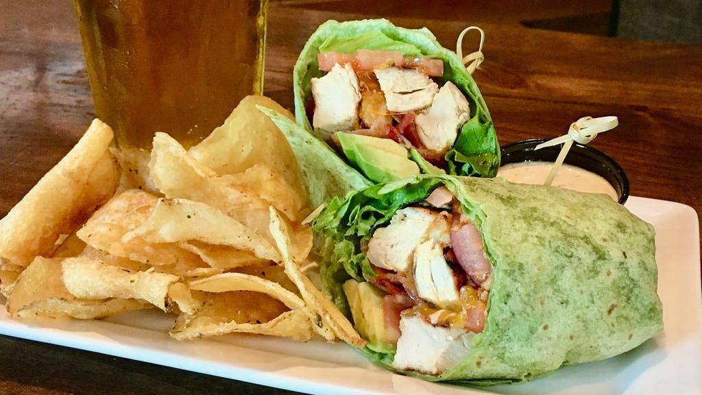 Alpine Chicken Wrap · Chilled, roasted chicken with chipotle ranch, cheddar, avocado, bacon, lettuce, tomato & onion in a flour tortilla.