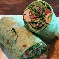 Southwest Wrap · Chilled, roasted chicken, mixed greens, avocado, corn & black bean relish, chipotle ranch in...