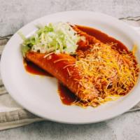 Chicken Enchiladas · Shredded chicken, enchilada sauce, cheese & lettuce.