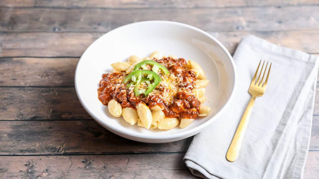 Chili Mac · Mac and cheese topped with our signature chili.