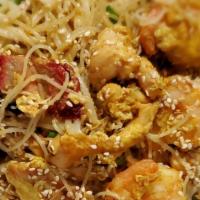 Singapore Rice Noodles · Thin rice noodles stir-fried  with chicken,  roast pork, and shrimp