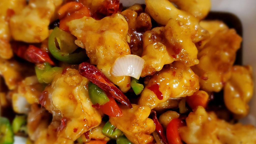 General Tso'S Chicken · Hot and spicy. Name for a famous Chinese general who love this hearty combination of battered chicken and fresh pepper in a sweet and  hot spicy red sauce.