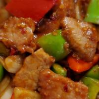 Mongolian Beef · Beef with bell pepper and onions stir fry in Chinese satay sauce . Hot and spicy.