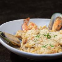 Linguine Di Mare · Wild prawns, seasonal wild caught fish, scallops, mussels & linguine pasta, tossed with your...