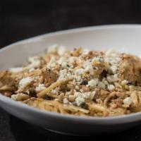 Linguine Marco · Roasted chicken & garlic cloves, capers, pine nuts & linguine pasta, tossed with a white win...