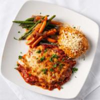Pollo Parmigiano · Lightly breaded chicken breast covered with marinara sauce, mozzarella & Parmesan cheeses, s...