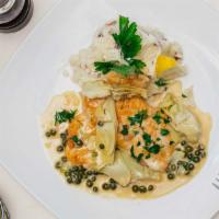 Veal Piccata · veal tenderloin medallions or chicken breast sautéed with artichoke hearts, capers, lemon, w...