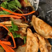 Spicy Korean Steak  Tacos  Combo · With pot stickers and soda
shredded cabbage, sriracha, cilantro, chipolet sauce