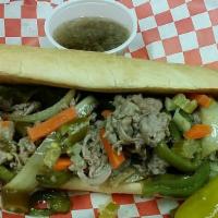 Italian Beef Combo · Includes fries and soda
Thin sliced roast beef with sautéed sweet bell pepper and onions.