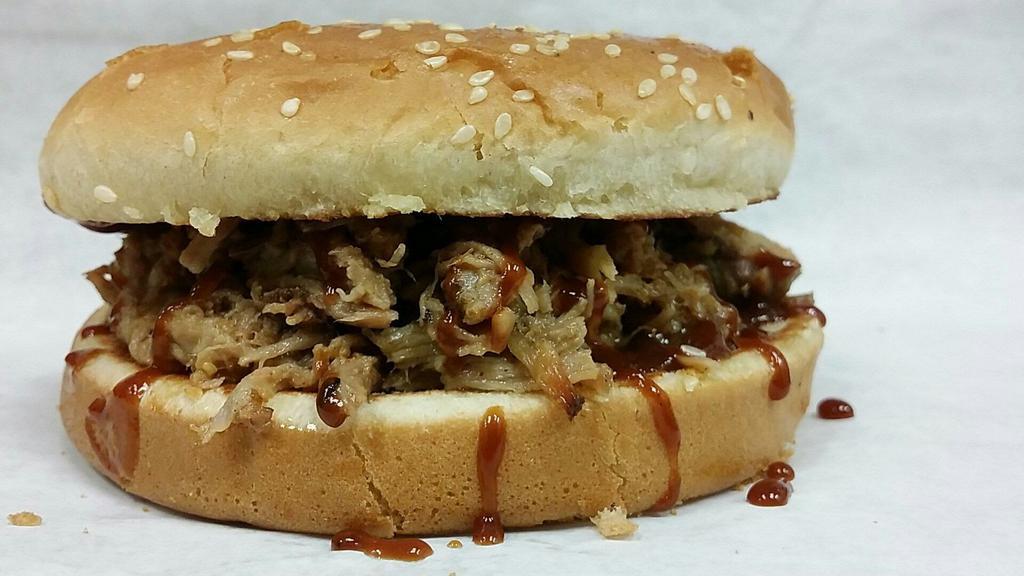 Bbq Pulled Pork Sandwich Only · Hickory smoked pulled  pork with bbq sauce