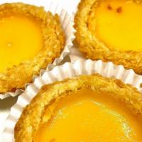 Bd28. Baked Egg Custard Tart (3) · Egg tart is a kind of Western-style pie with egg pulp as filling. The method is to put the c...