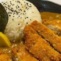 Chicken Katsu Curry · Fried panko breaded chicken, takuan, nori with Japanese style curry with top of nori seasoni...